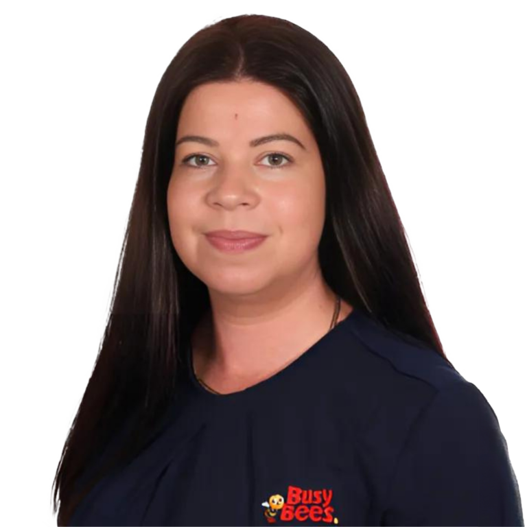 Melanie Gapes, Manager of Busy Bees Fraser Coast, wearing a navy blue shirt with a "Busy Bees" logo.