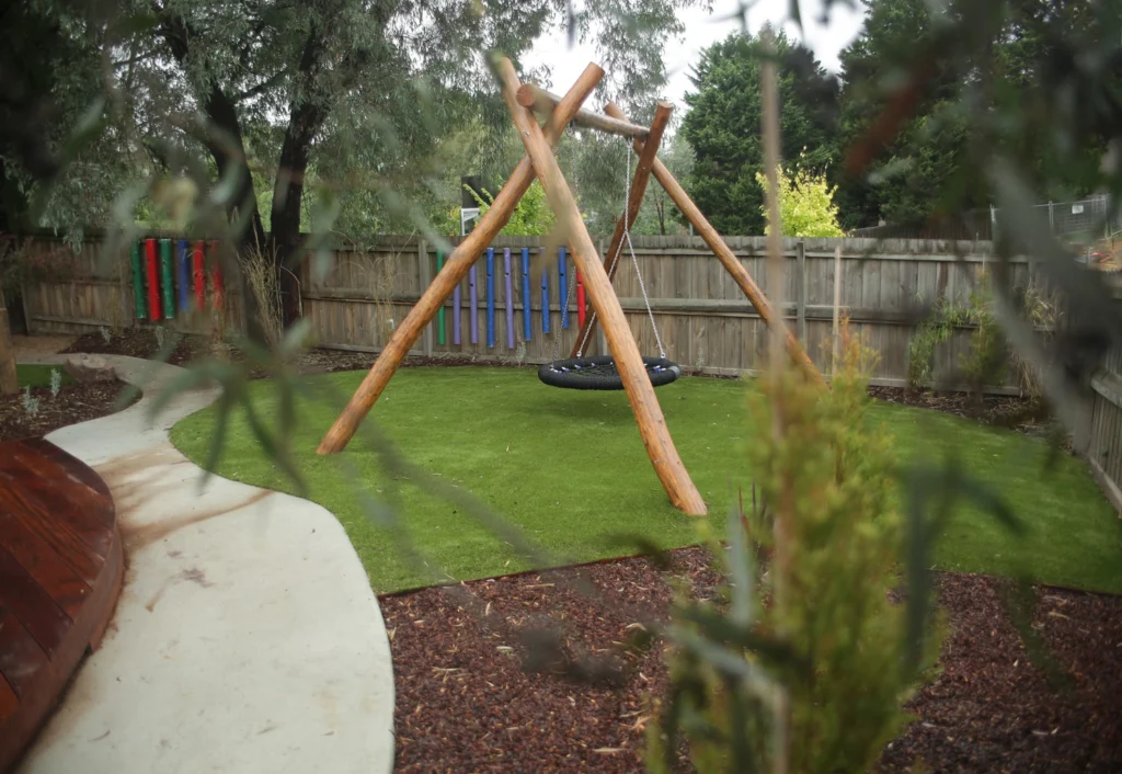 A wooden swing to promote fun and active play at Doncaster East childcare.