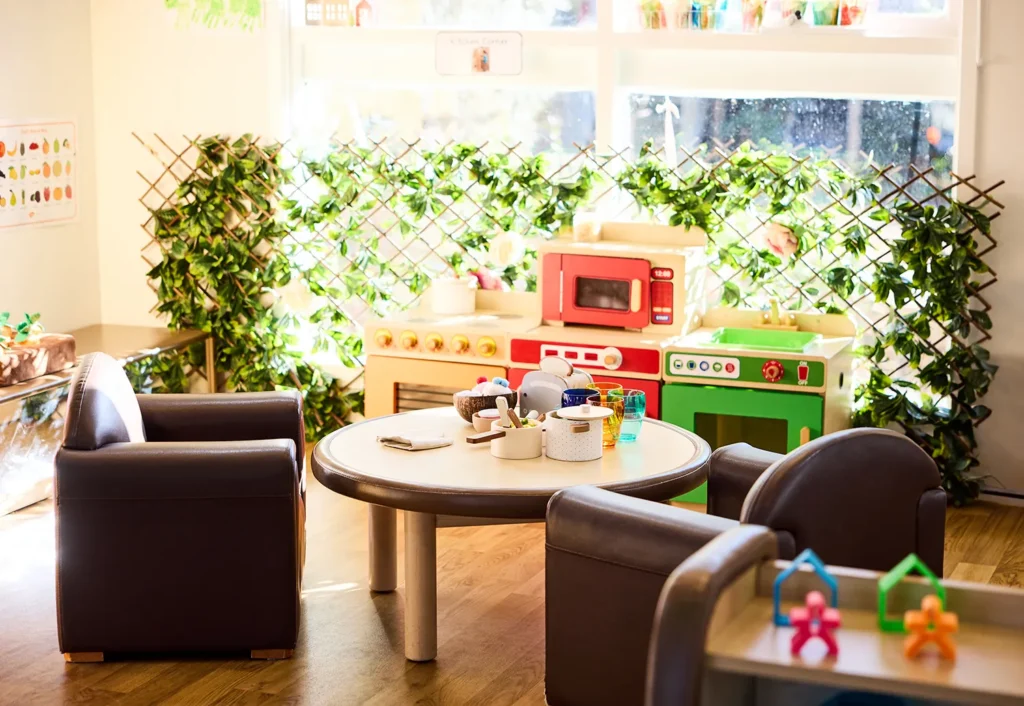 Pretend play kitchen with table and chairs at Busy Bees Early Learning at Doncaster East