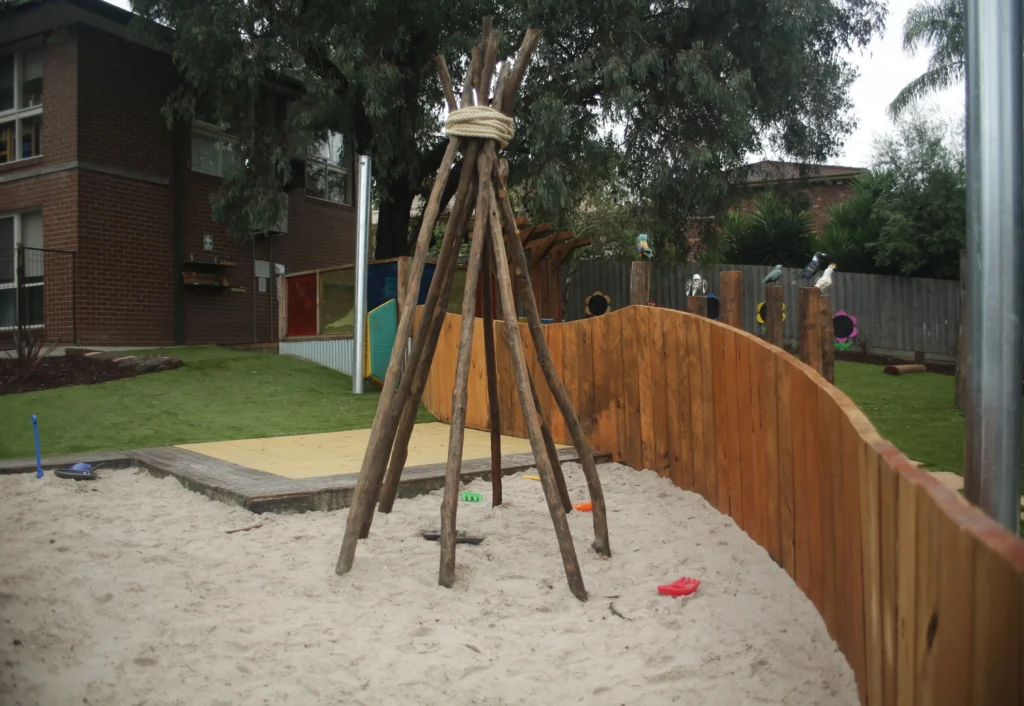 Teepee within a sandpit at Melbourne day care centre.